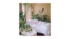 DMDMBSR matte black gecko wall art adds modern flair to any exterior.
