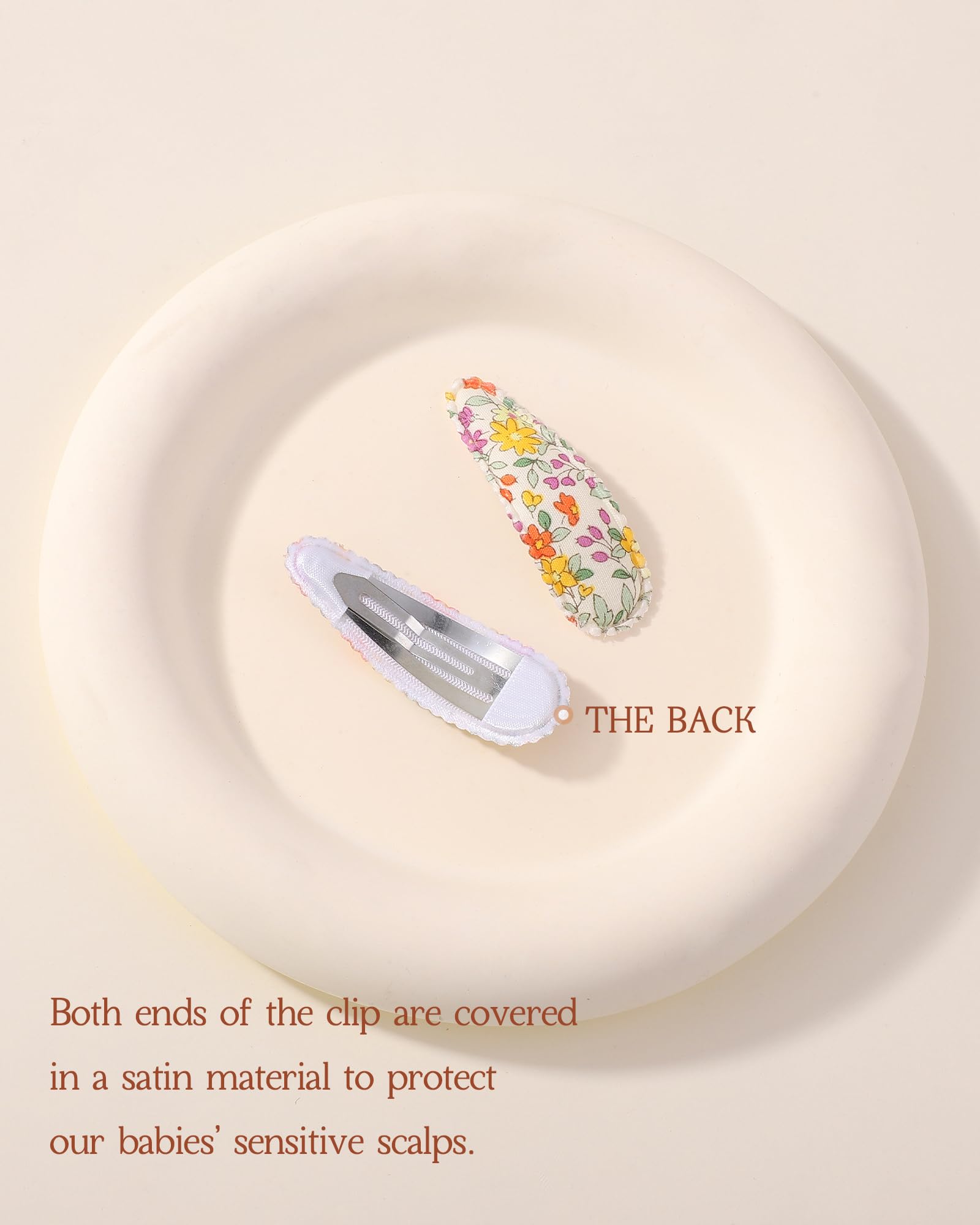 Doboi navy pink cloth snap clip secures toddler hair without fuss.