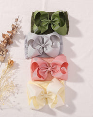 doboi baby headband handmade ribbon bow close-up and craftsmanship