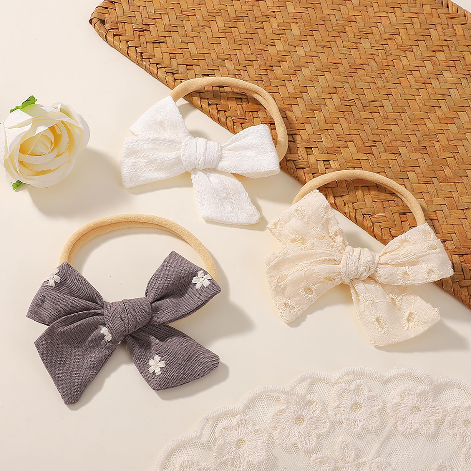 doboi adjustable nylon headband featuring a linen bow