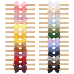 doboi soft nylon headband provides gentle, secure fit for newborns.