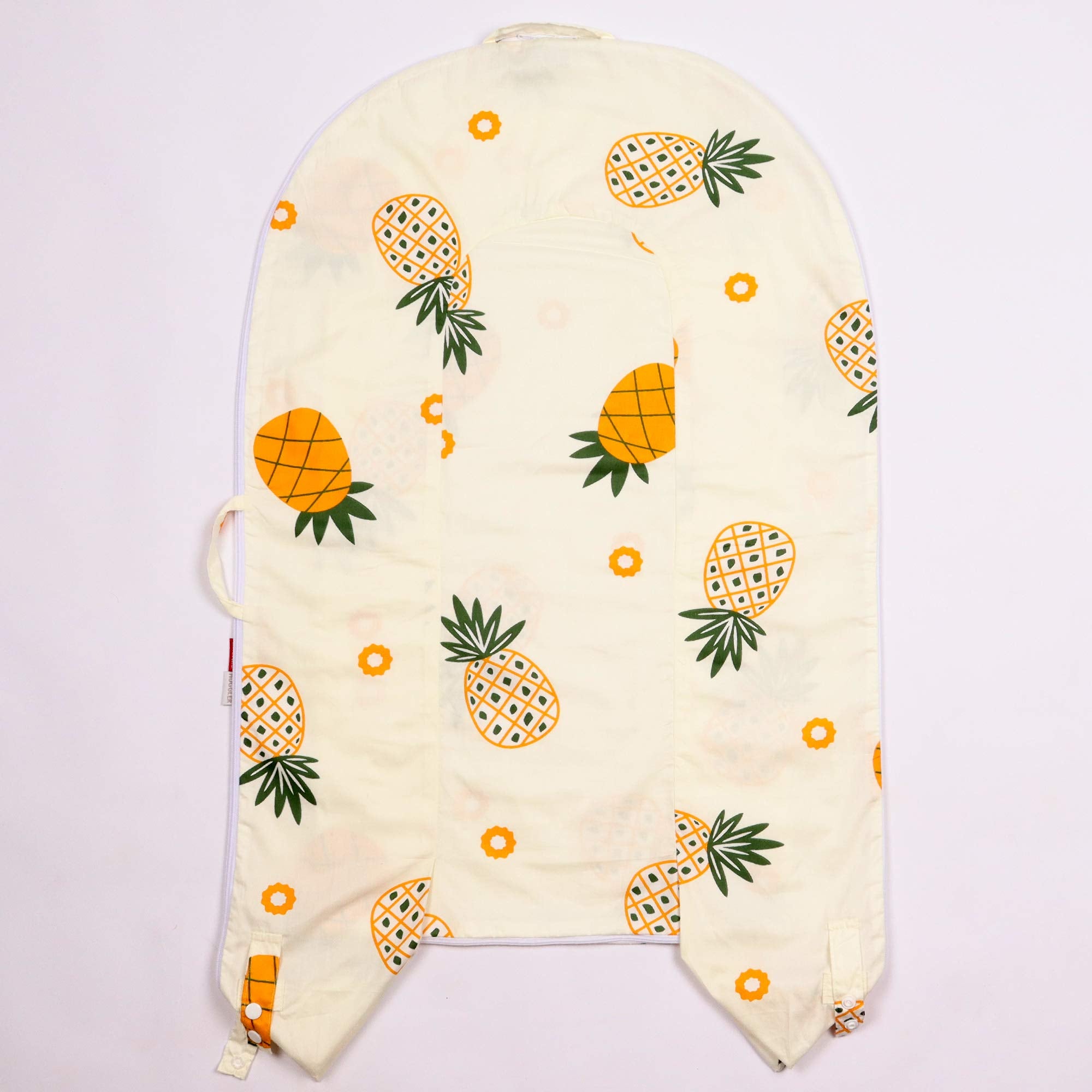 DockATot deluxe lounger cover demonstrates non-toxic, premium cotton fabric for sensitive skin.