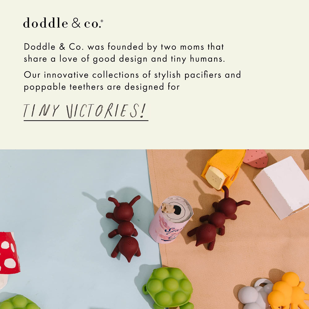 DODDLE & CO London Classic Pacifier teething-safe design supports early teething.