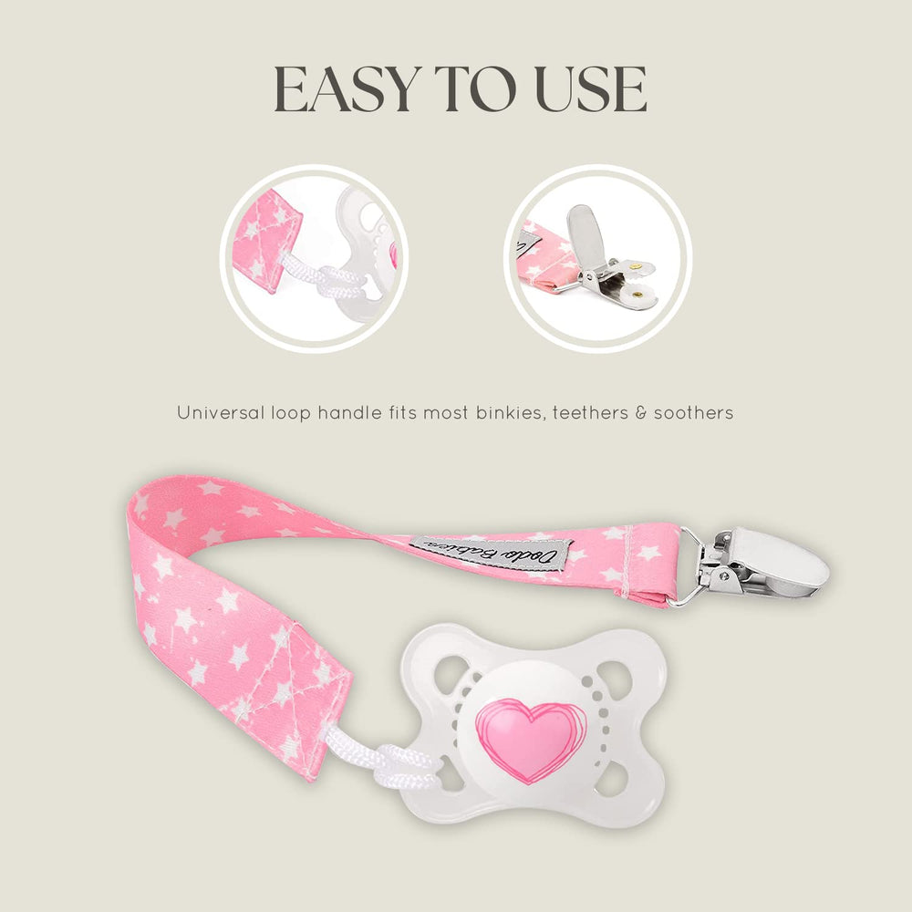 Dodo Babies metal clip attaches softly to bibs without snagging fabric.