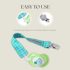 Pacifier clip attached to clothing demonstrates secure, quick-access design.