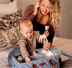 DOKUS & CO Luxe Diaper Caddy Tote in car for quick organization on road trips.