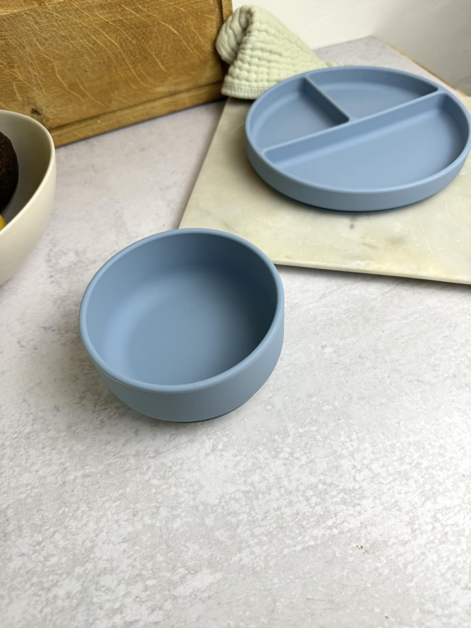 Dollop suction plate close-up shows BPA-free silicone quality for safe feeding.