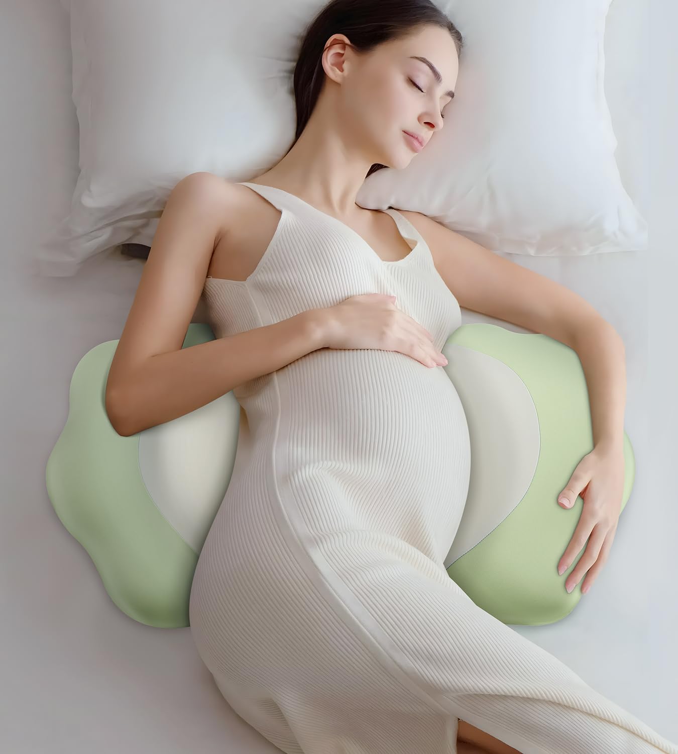 DONAMA pregnancy pillow with memory foam core cradles the belly for targeted support.
