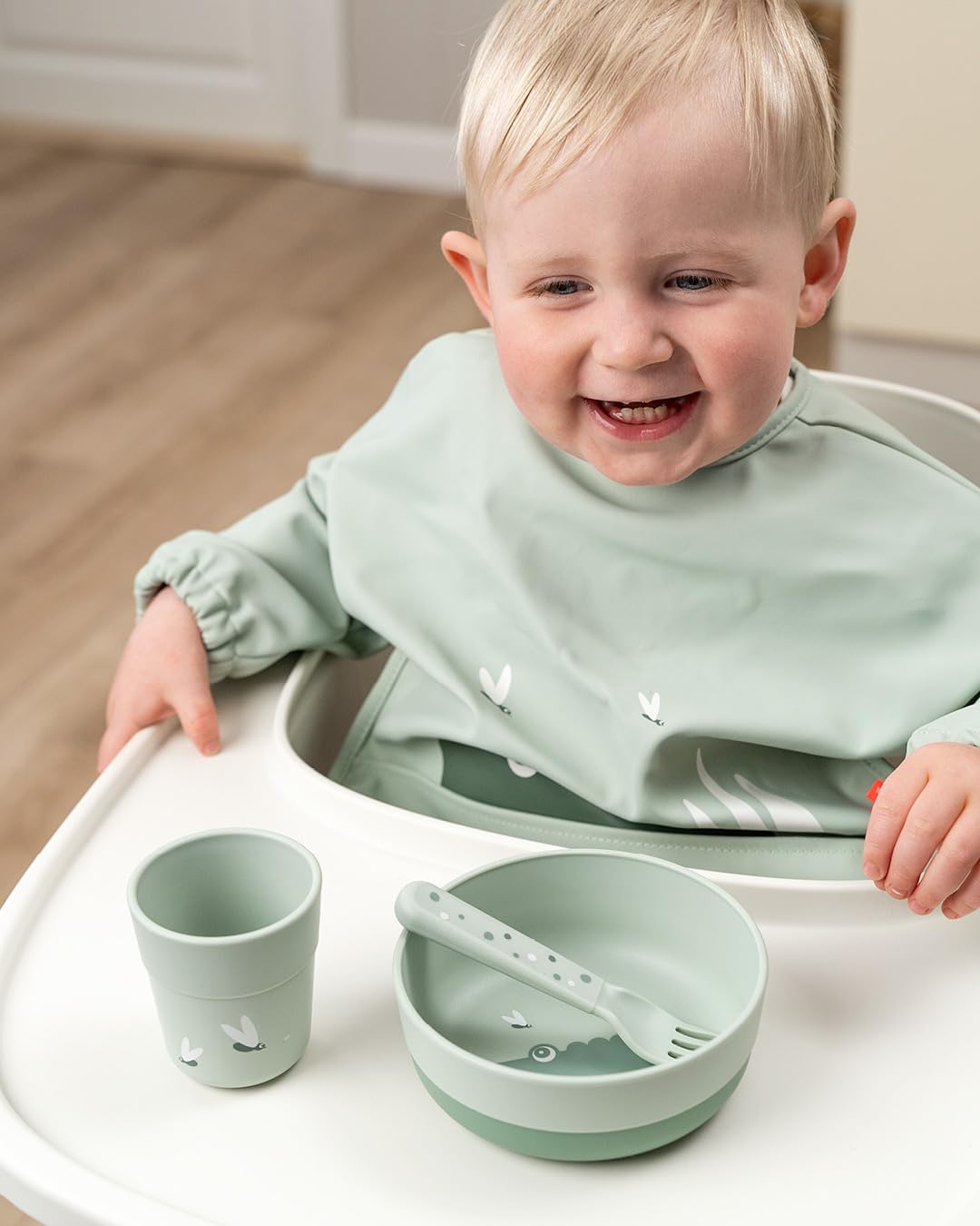 Done by Deer waterproof elastic sleeves protect clothing during self-feeding.