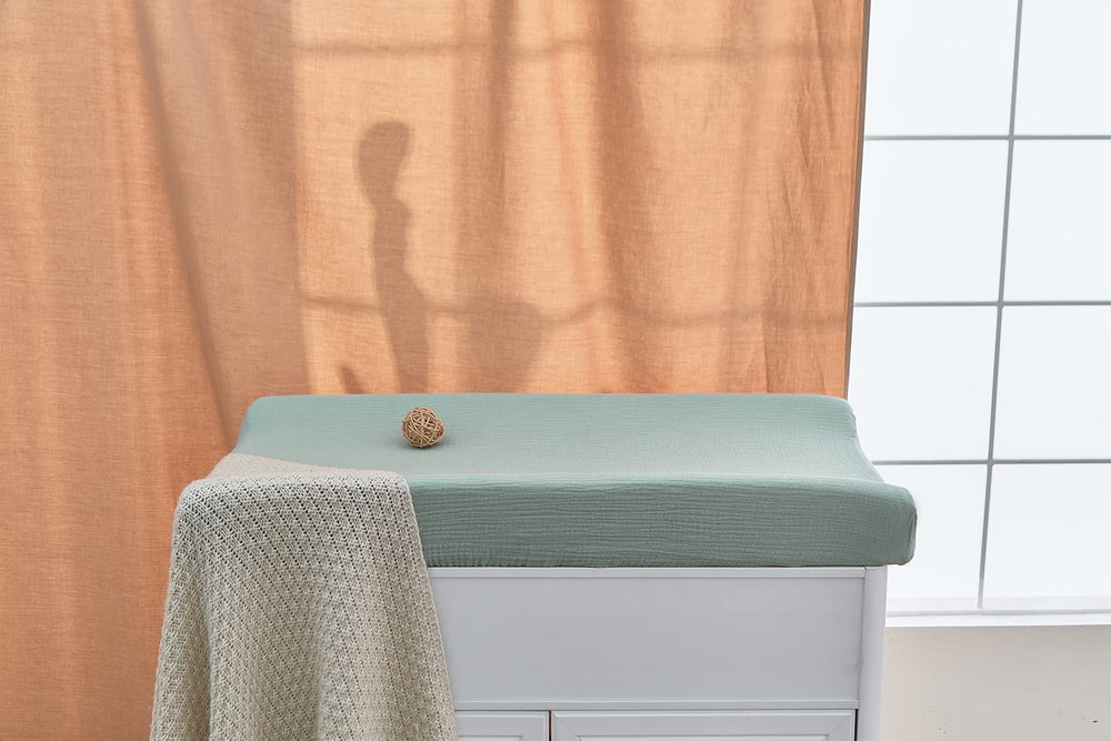 Donomilo nursery ready cover adds soft breathable layer.