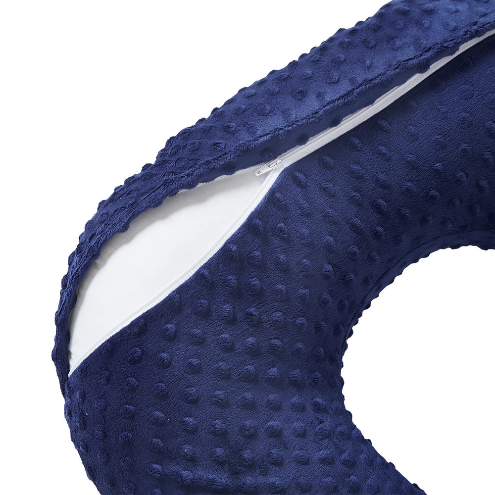 DONOMILO nursing pillow baby-propping image demonstrates stable support for awake feeding and play.