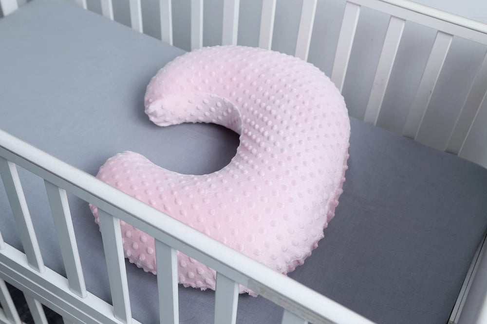 DONOMILO pillow assists with safe propping for awake baby time.
