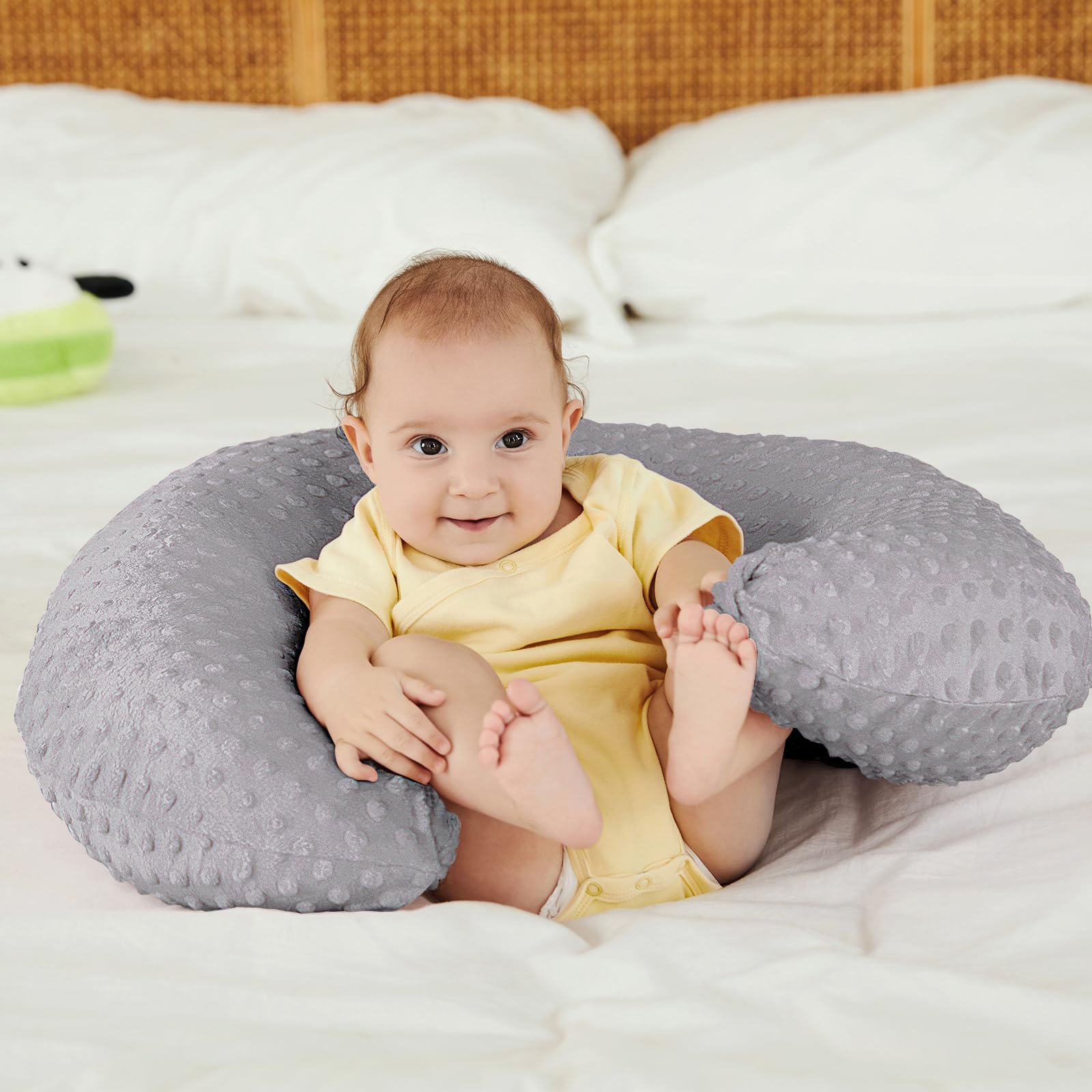 DONOMILO Upgraded Nursing Pillow used for baby feeding and propping during early months.