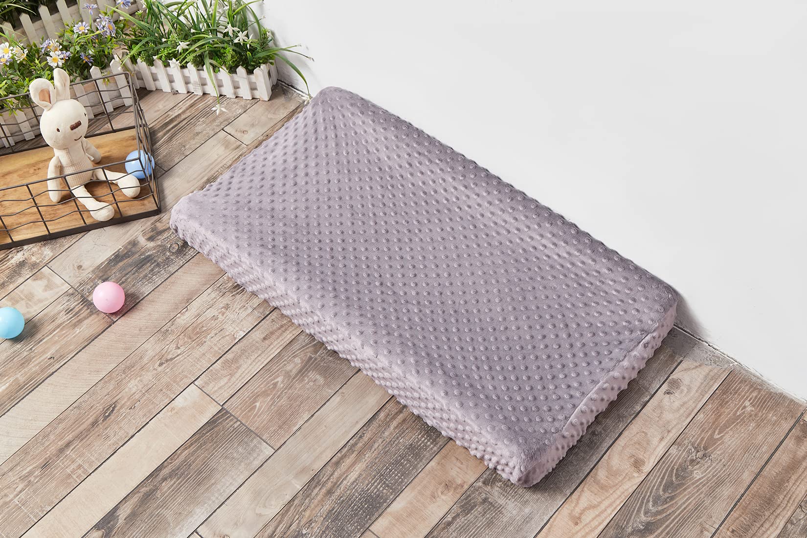 DONOMILO rose gray changing pad cover blends with nursery decor