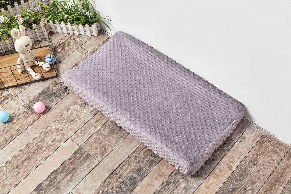DONOMILO rose gray changing pad cover blends with nursery decor