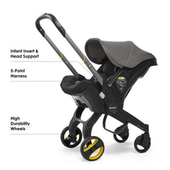 DOONA infant insert and head support offering ergonomic comfort for newborns.