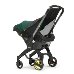 DOONA Sunshade Extension with snap-on clips for quick, tool-free attachment.