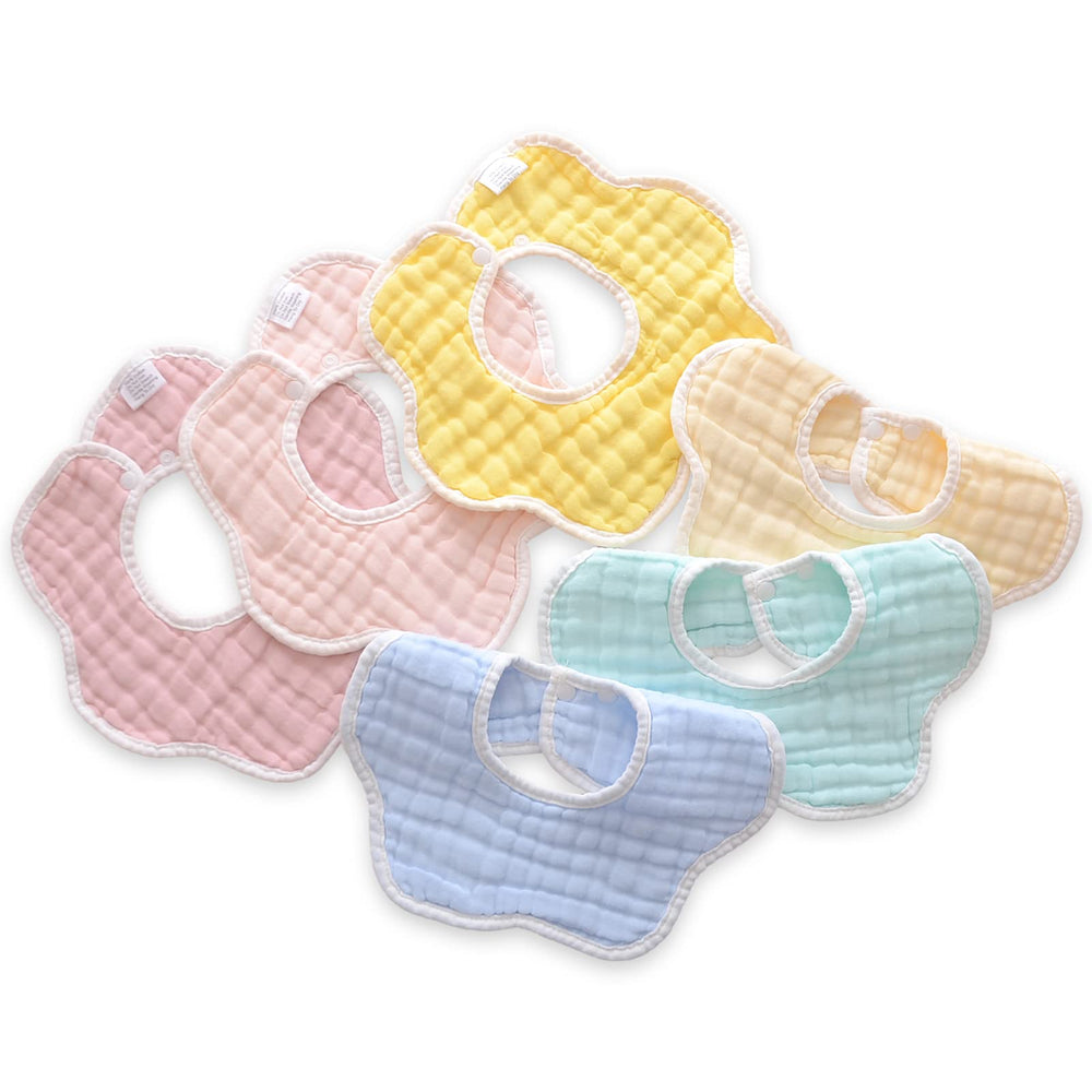 DOSMINE muslin baby bib close-up showing 8-layer gauze for superior drool absorption