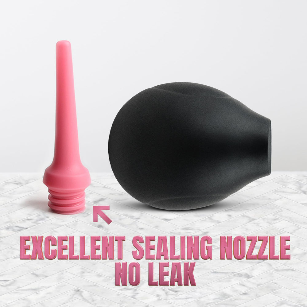 DoucheRight black-pink nozzle demonstrates ergonomic styling for comfortable handling.