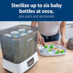 Dr. Brown's bottle parts tray keeps accessories organized during cycles.