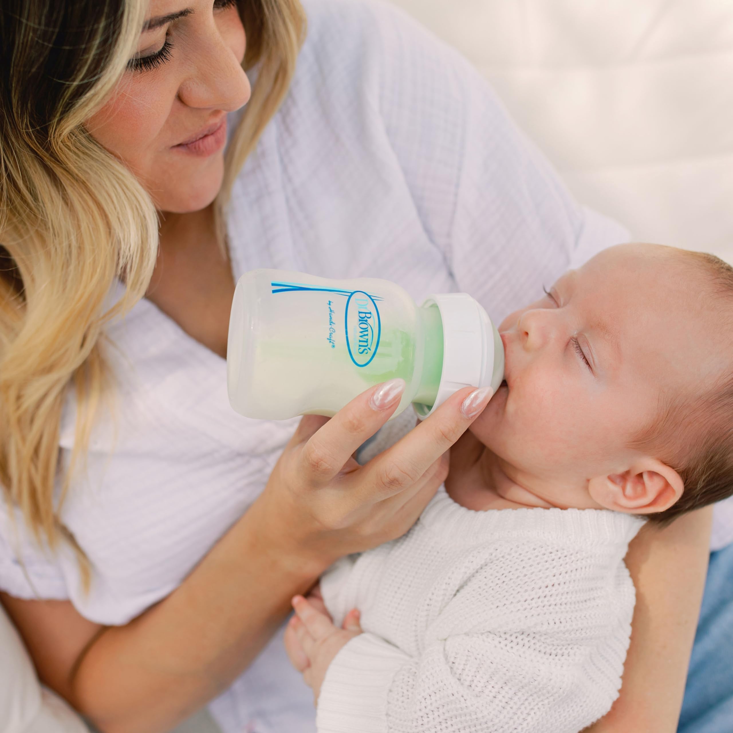 Top rack dishwasher safe glass bottle with BPA-free materials.