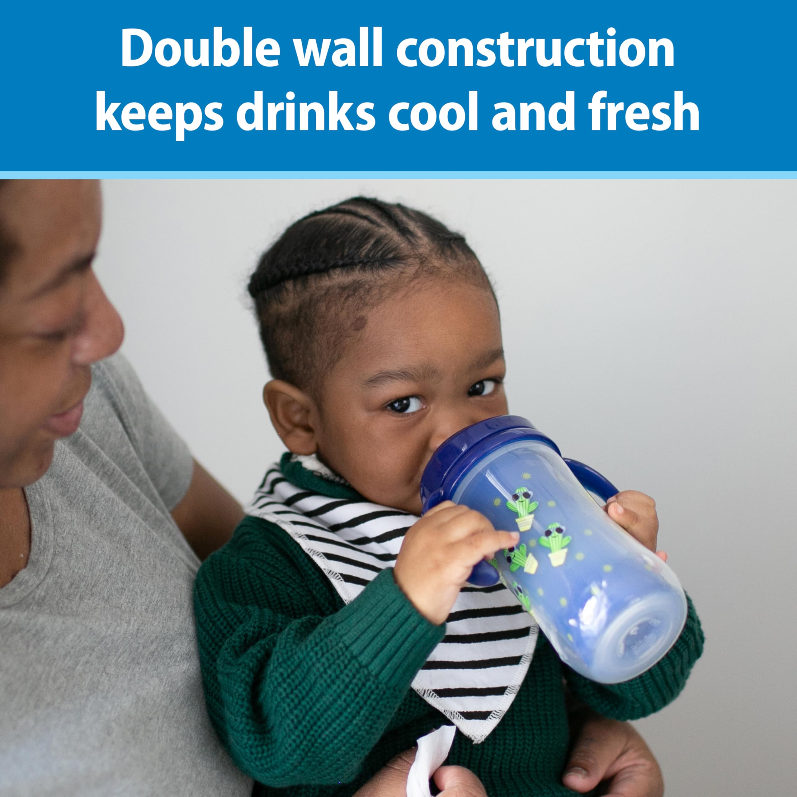Dr Brown's Milestones blue sippy cup with removable handles for growing grip.