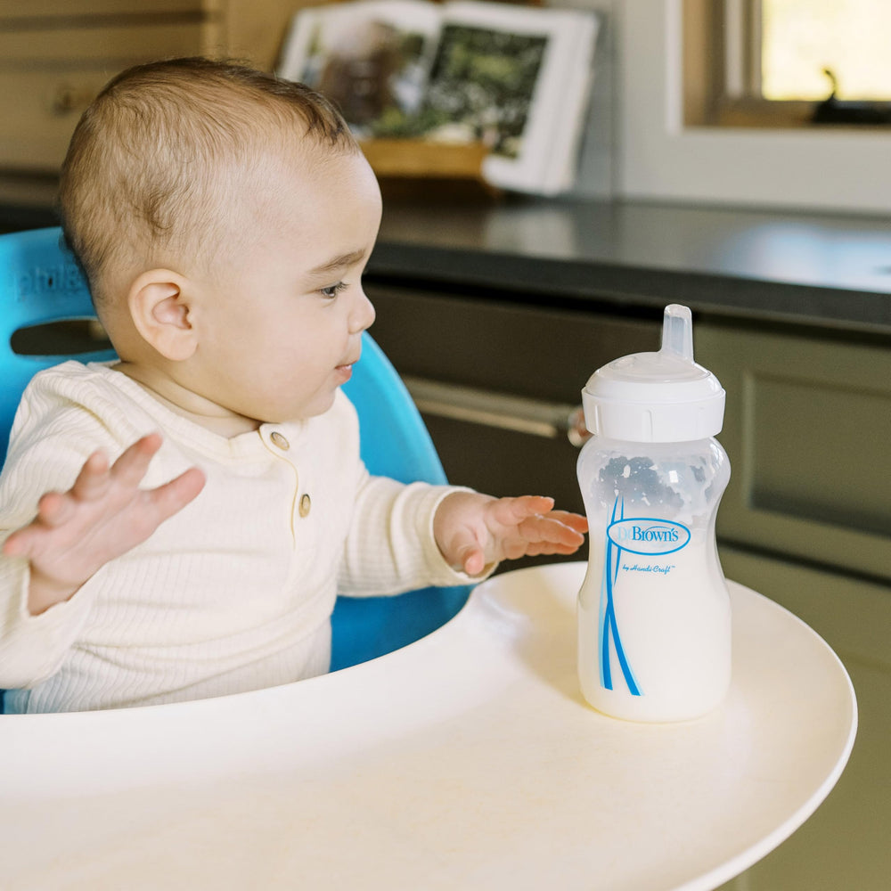 Vent removal step to switch to sippy spout on Dr. Brown's bottle