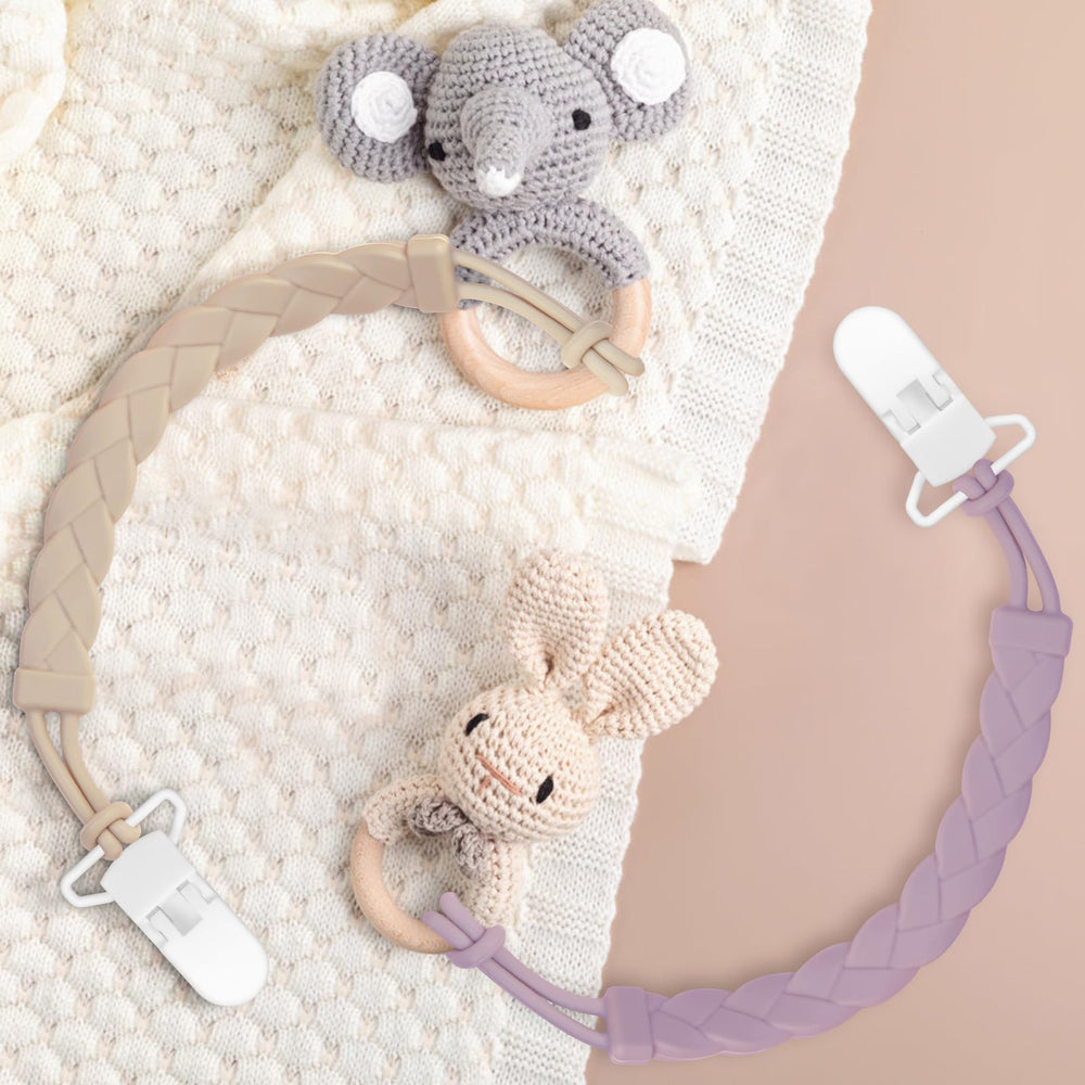Draklary pacifier clip with simple attachment for easy one-handed use.