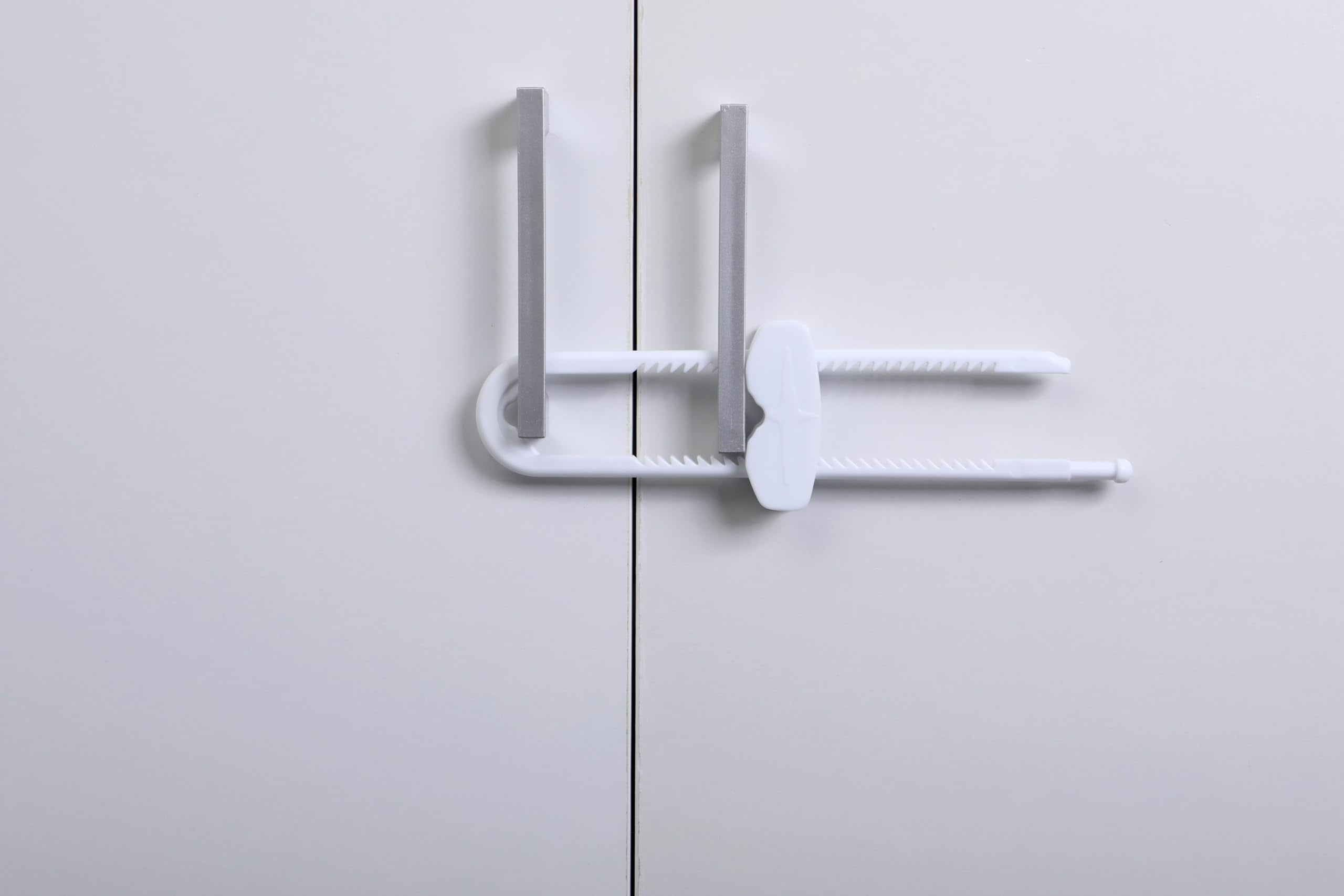 Dreambaby sliding locks on pantry doors for safe storage of small items