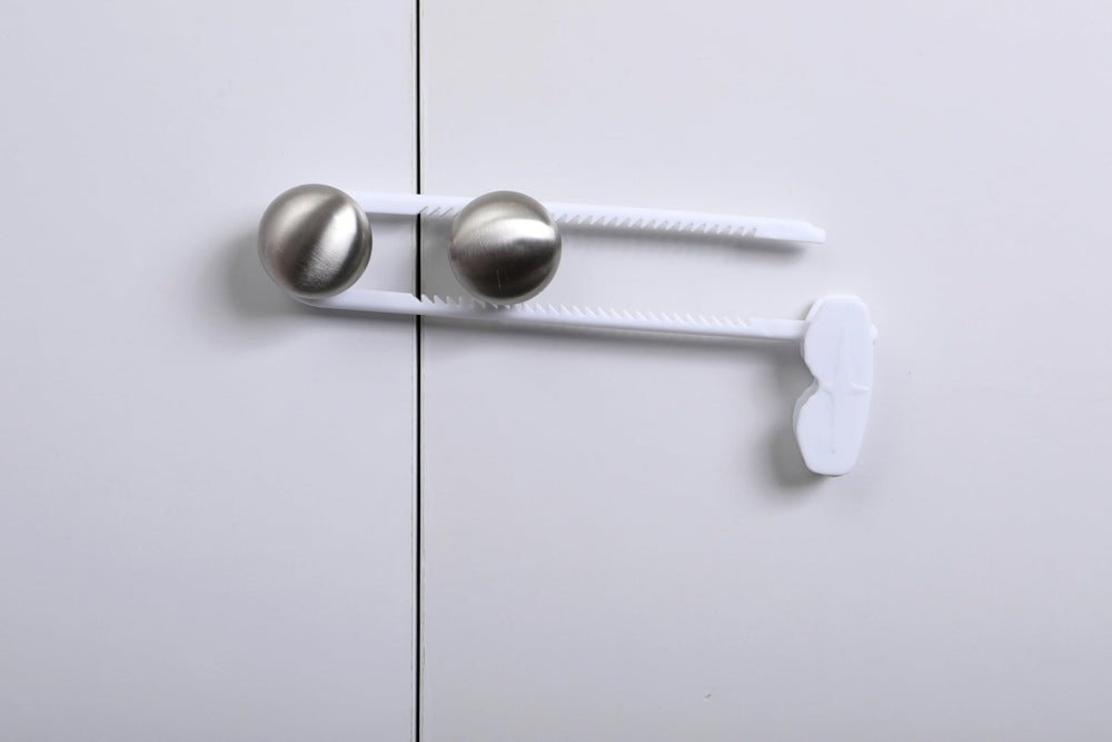 Dreambaby sliding locks on side-by-side fridge doors for easy access control