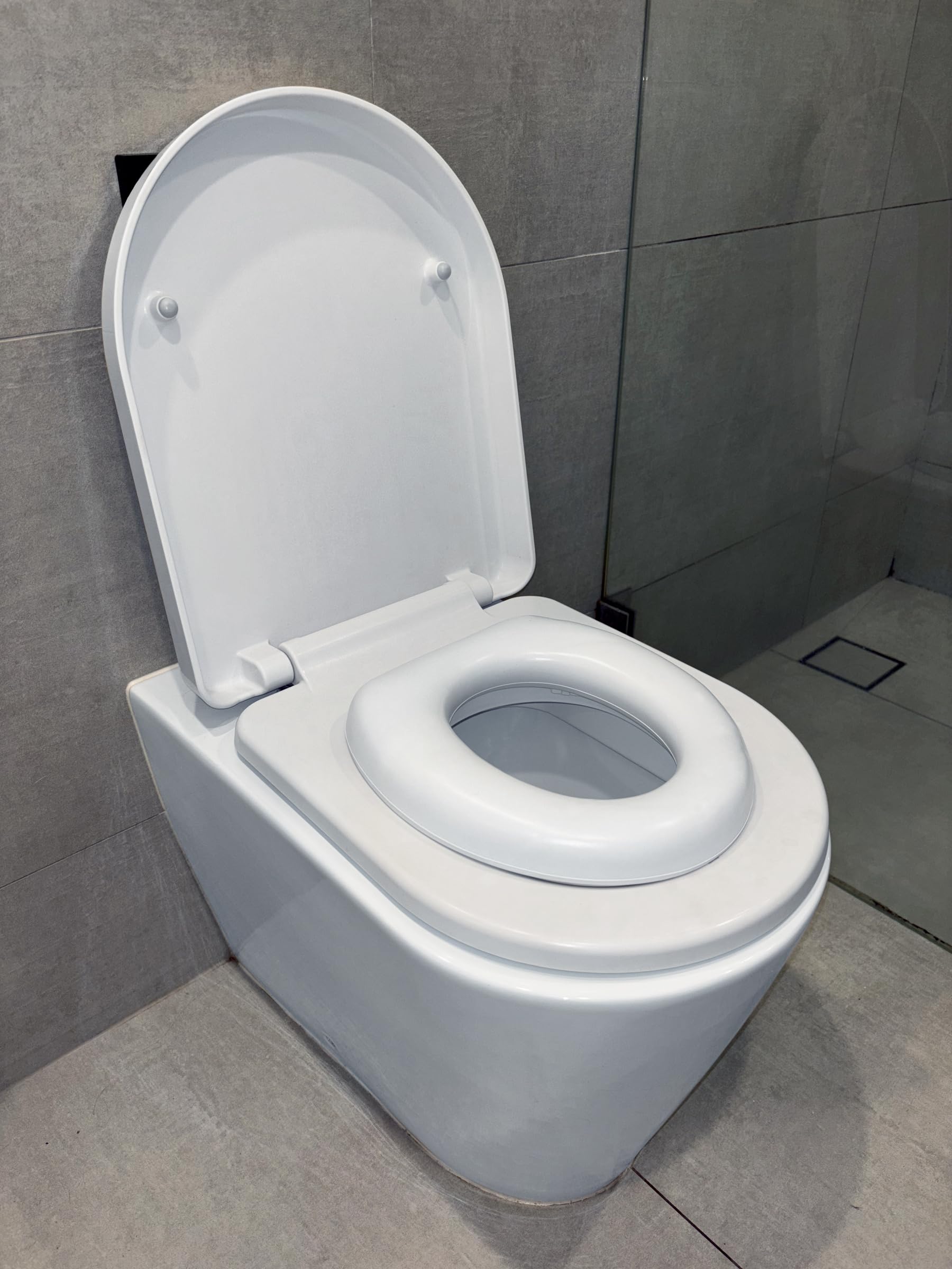 Dreambaby Soft Touch Potty Seat portable and lightweight for travel with toddlers