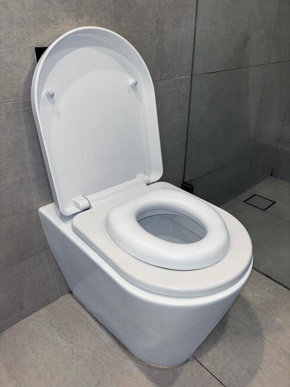 Dreambaby Soft Touch Potty Seat portable and lightweight for travel with toddlers