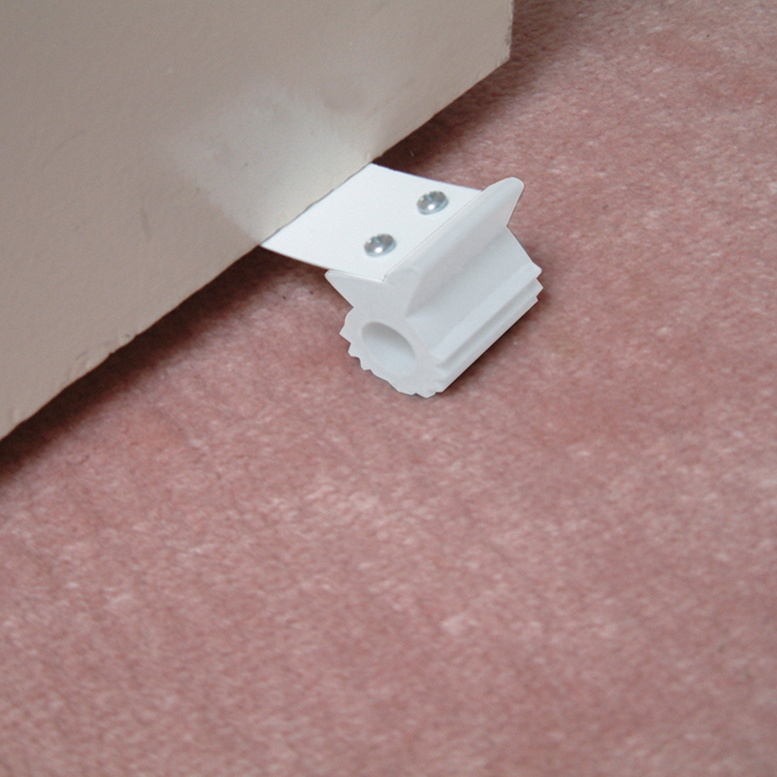 Dreambaby Under Door Gripper close-up reveals flexible rubber material.