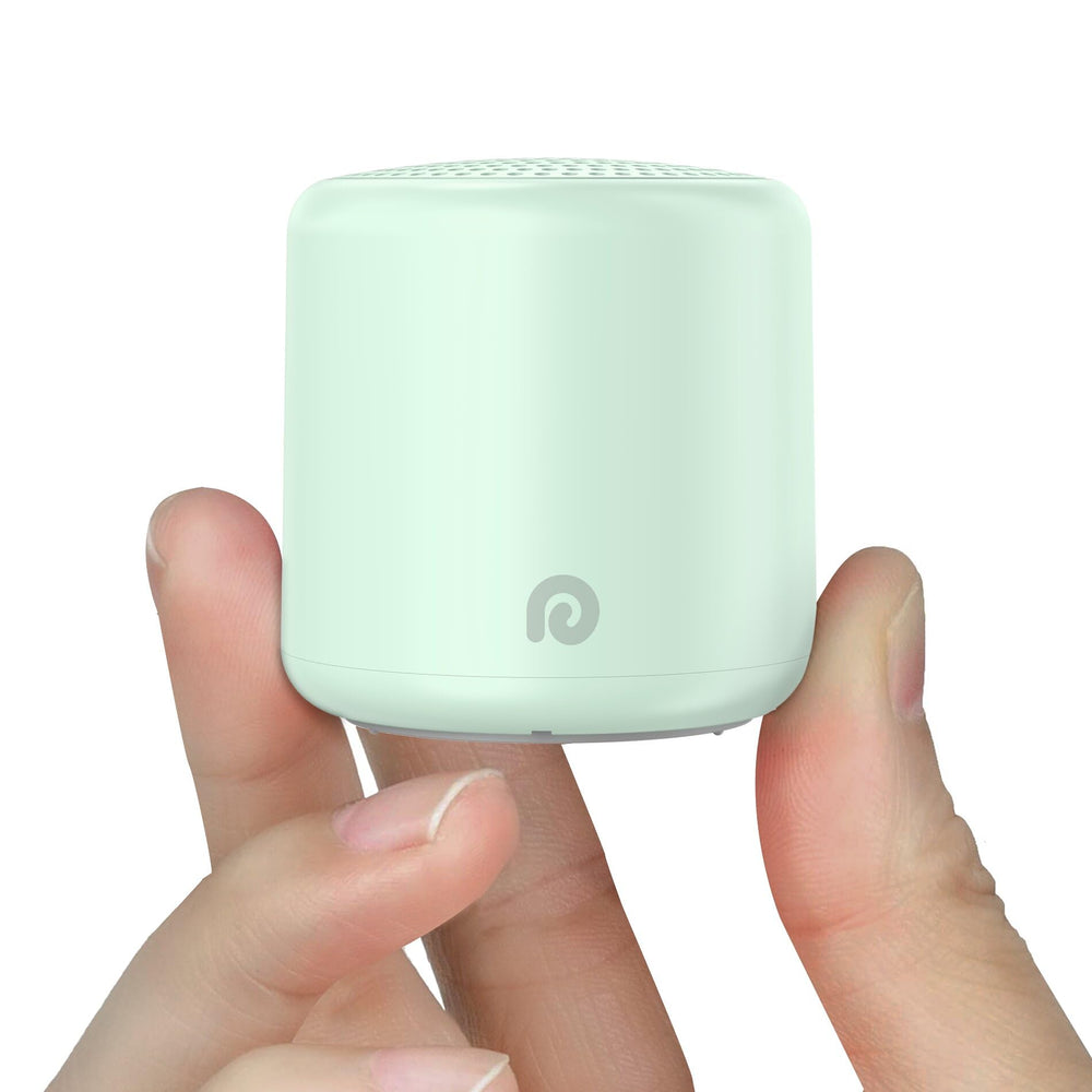 Dreamegg Pocket Sleep egg-sized device shown for travel, a compact sleep aid on the go.