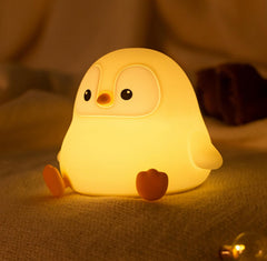 DREAMING MY DREAM penguin night light design offers a gentle nursery glow for calming evenings.