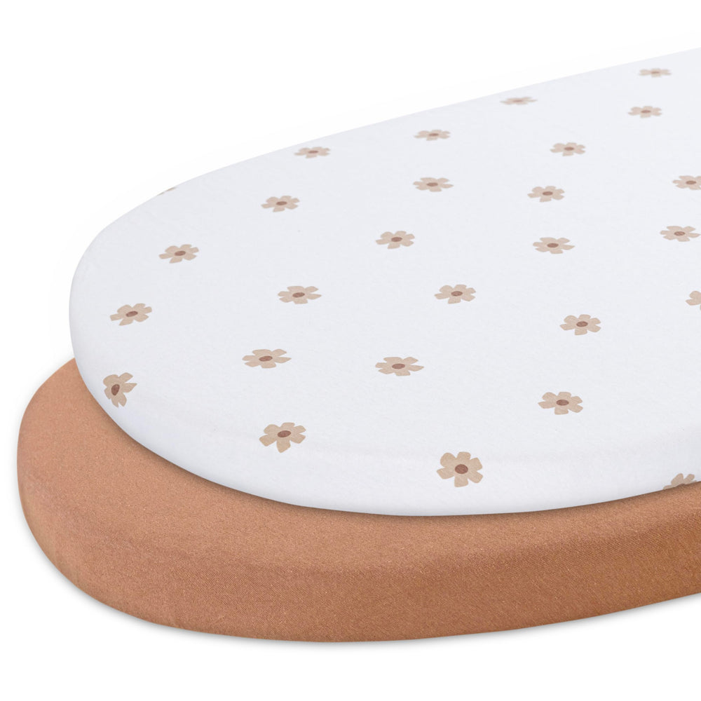Dreamology bassinet sheets in brown flowers for rectangular cribs, soft and breathable for baby comfort.