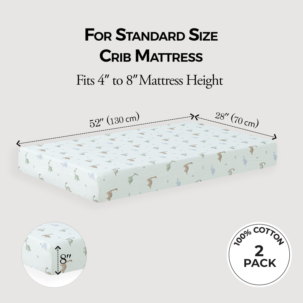 Dreamology deep-pocket eight-inch close-up shows secure snug fit on standard crib mattress.