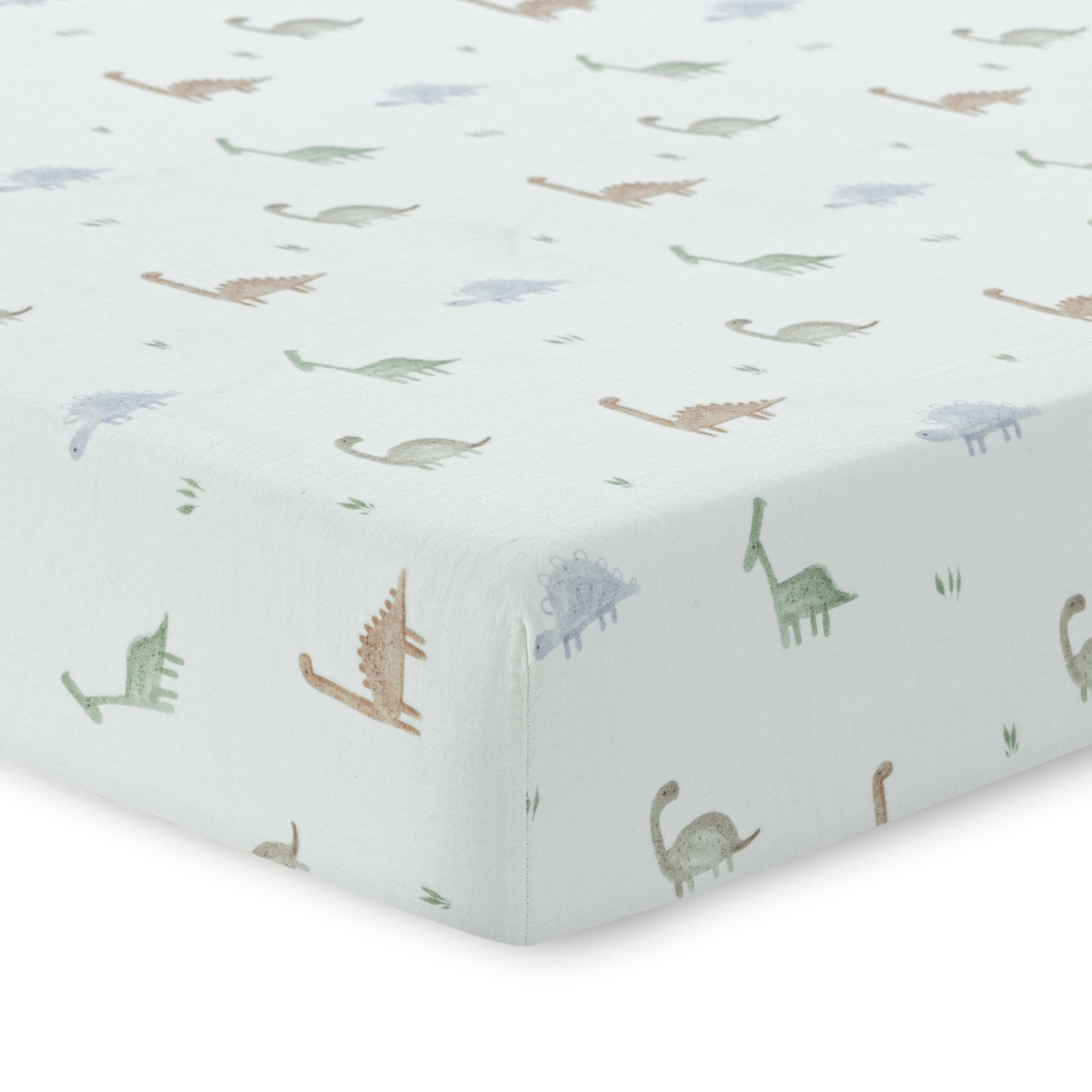 Dreamology dino print crib sheet in a soft cotton muslin finish for gentle baby comfort.