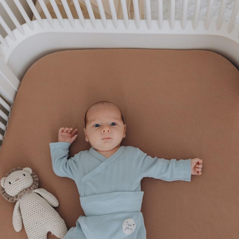 Dreamology mini-crib-sheets secure-fit-24x38 demonstrates reliable mattress grip.
