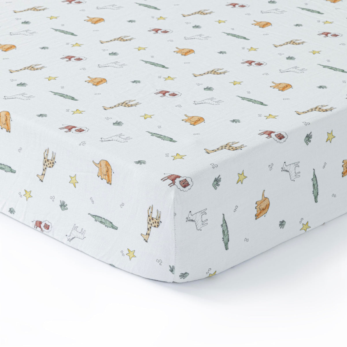 Dreamology muslin crib sheet with animal pattern provides soft, breathable comfort for nursery sleep.
