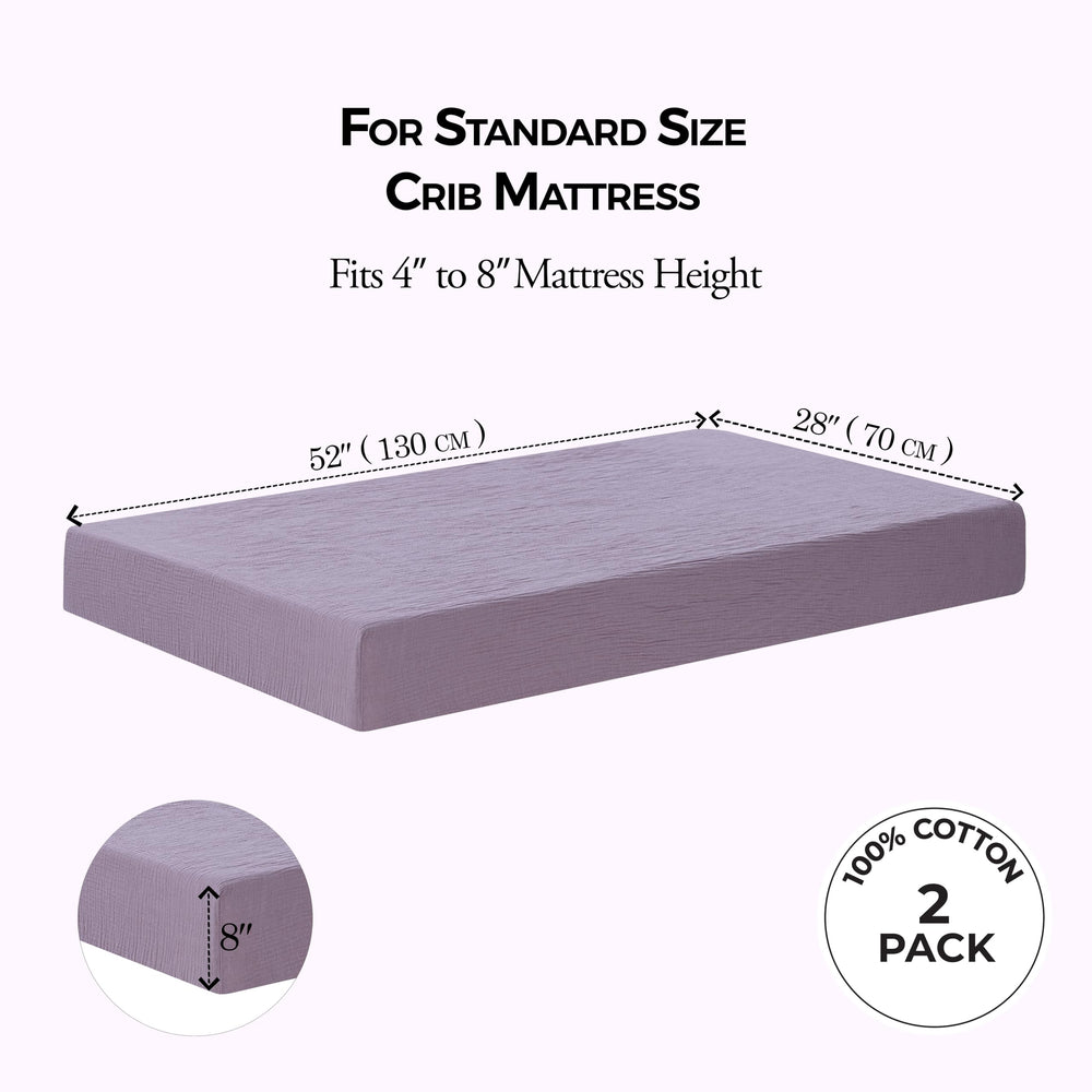 Dreamology muslin crib sheet demonstrates secure standard crib fit with elastic edges.