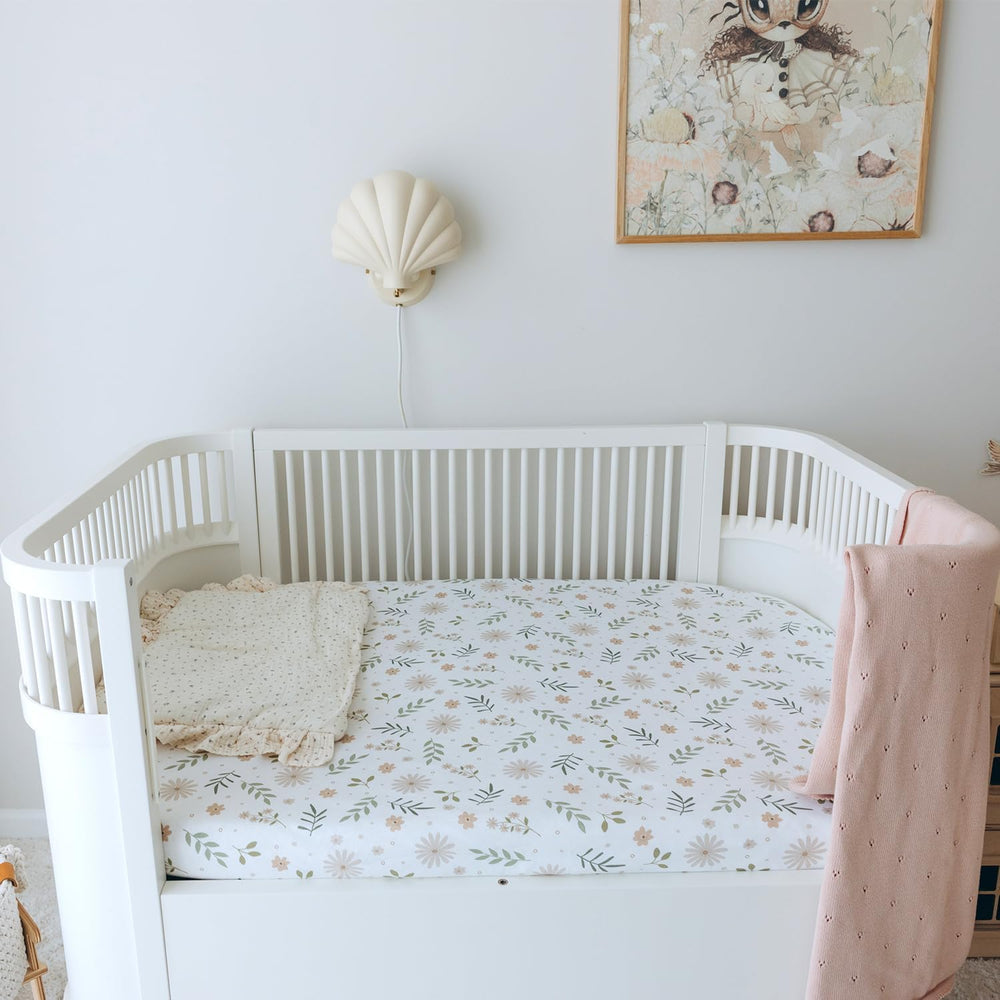 Dreamology muslin crib sheets feature elastic edges for a snug crib fit