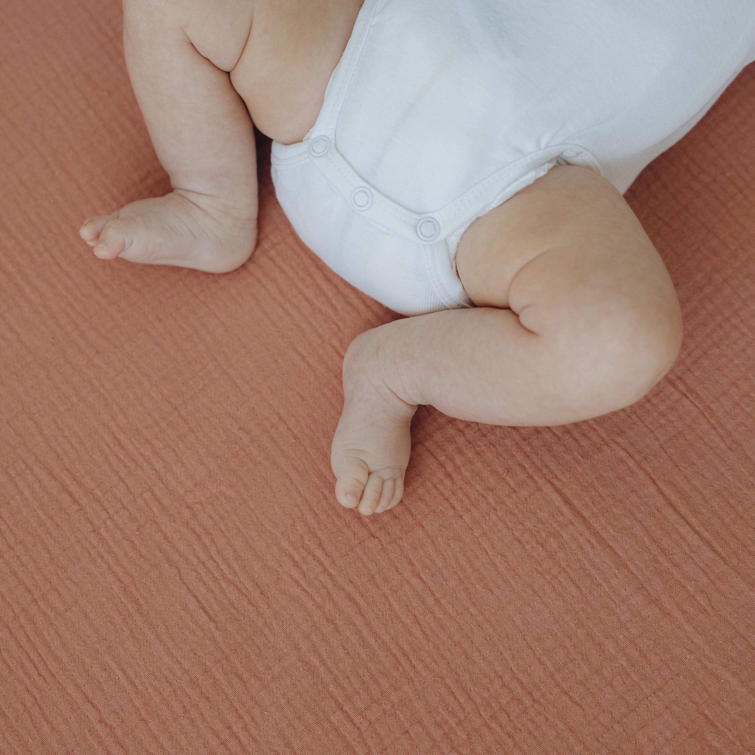 Dreamology muslin crib sheets on toddler bed, versatile transition.