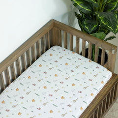 Dreamology muslin mini crib sheet with elastic six-pocket edges for a snug fit