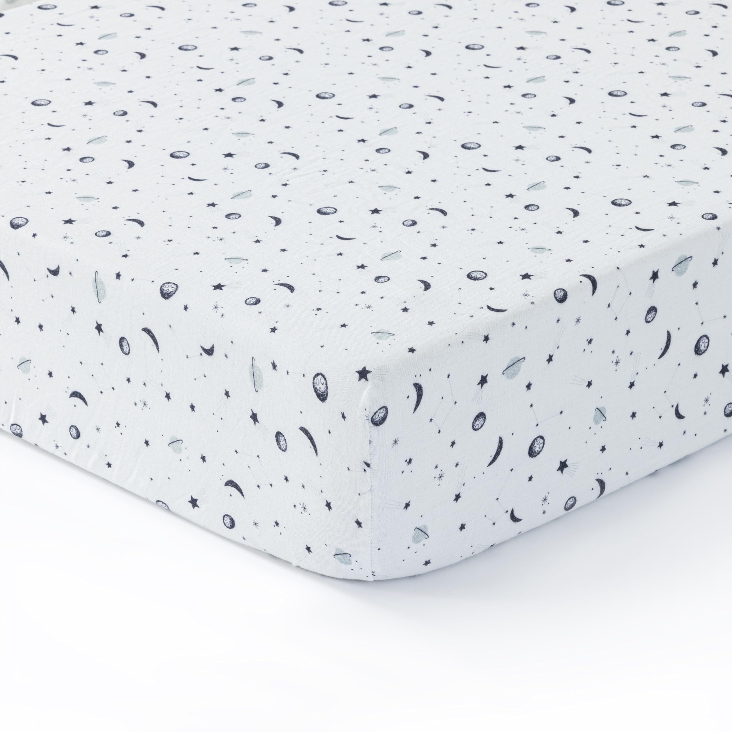 Dreamology Planets crib sheet flat lay shows standard 28x52 crib size