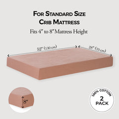 Dreamology rose pink crib sheet on mattress shows snug fit.