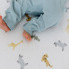 Dreamology sky blue crib sheet demonstrates machine-washable care for lasting softness.