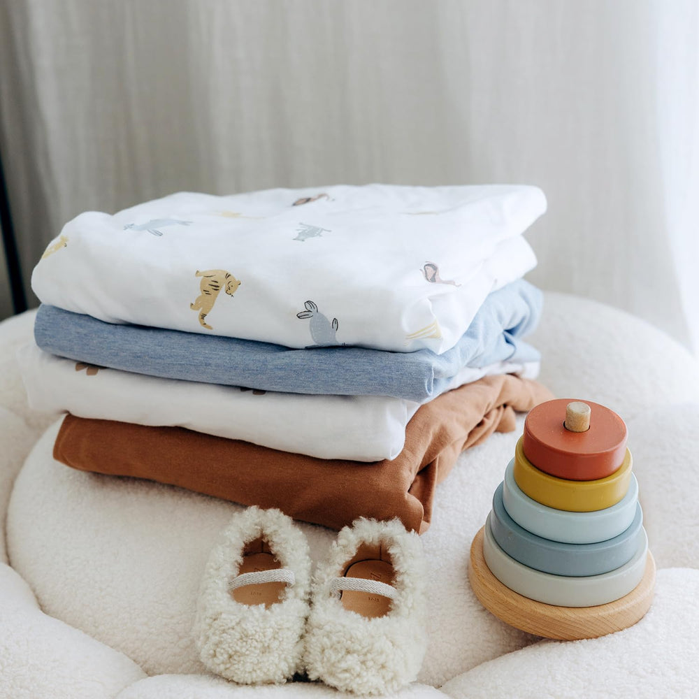 Dreamology sky blue animal design enhances nursery aesthetics with a playful touch.