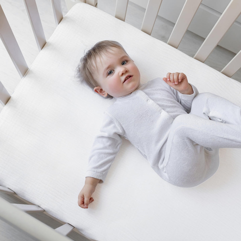 Dreams of Hugs nursery scene featuring cozy, inviting bedding.