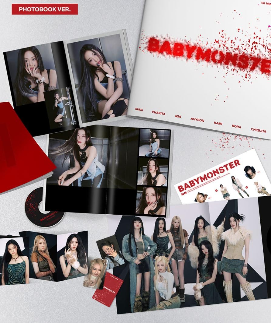 Dreamus BABYMONSTER BABYMONS7ER photobook interior pages with vibrant artwork